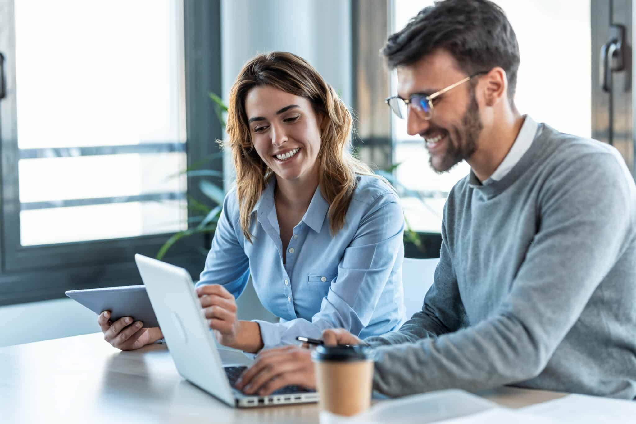 Coworkers discussing client branding
